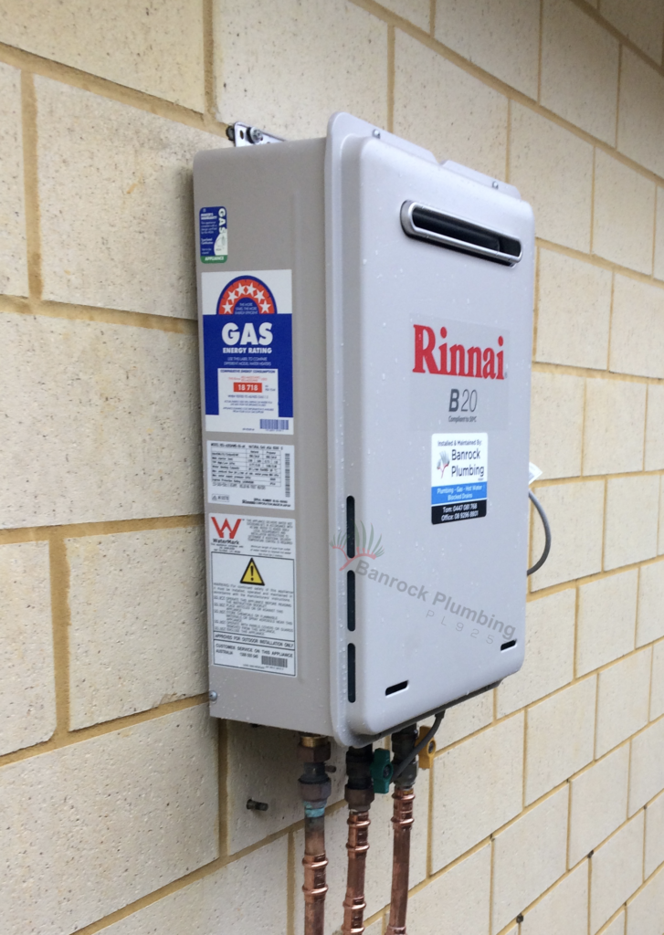 Rinnai B20 gas hot water system installed on cream brick wall