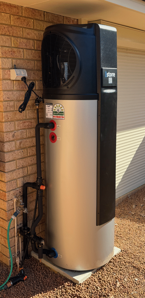 iStore 270L heat pump hot water system installed at a home in The Vines with outdoor power point.